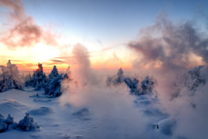 View from the Brocken Railway on the snowy winter landscape at the summit of the Brocken (1142m) in evening light, Harz, Saxony-Anhalt, Germany View from the Brocken Railway on the snowy winter landscape at the summit of the Brocken (1142m) in evening light, Harz, Saxony-Anhalt, Germany